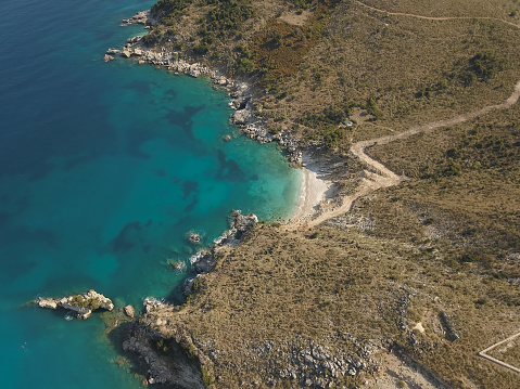 Beautiful seascape. Beach on coast of Ionian Sea in Albania, Ksamil, near Greece island Korfu. Birdseye view of Mirror Beach (Pasqyra) in Saranda, Albania (Albanian Riviera) View from drone