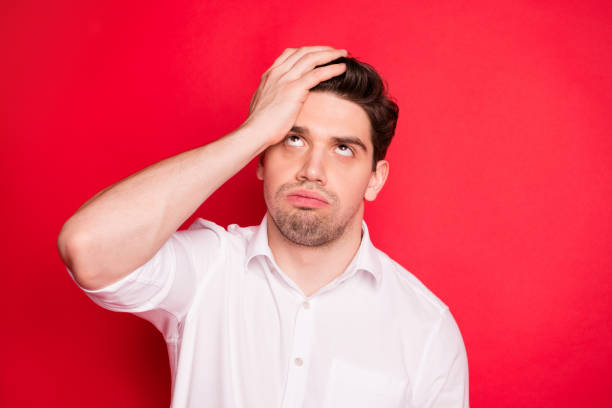 istock Close-up portrait of his he nice attractive dull disappointed gloomy grumpy sullen guy student exam fail failure bad result isolated over bright vivid shine red background 1168202614