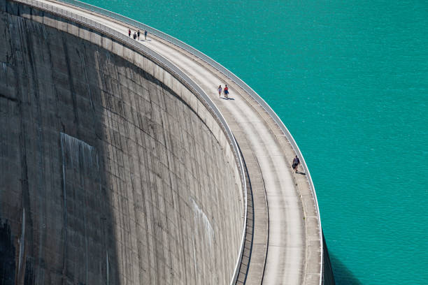 istock People walking on edge of Stausee Mooserboden Dam, Kaprun, Austria 1168203127