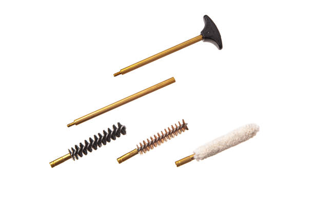 istock Weapon cleaning kit isolate on white background. Weapon care tools. Ramrod for cleaning gun. 1168205605