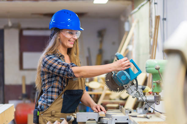 istock young woman working in carpenter's workshop 1168206278