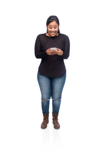 istock Excited young woman texting 1168214933