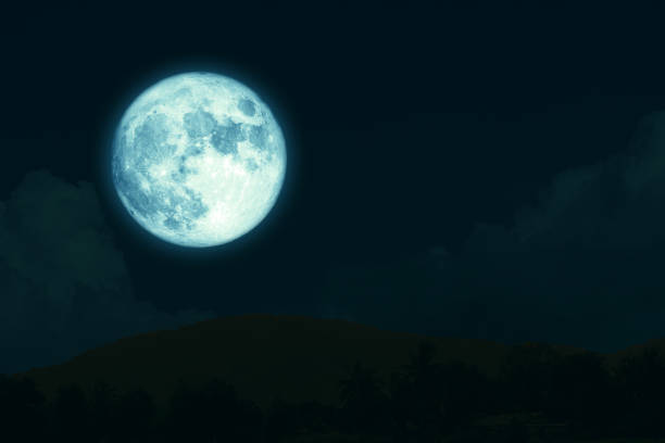 istock super full harvest moon on night sky back silhouette mountain 1168216465