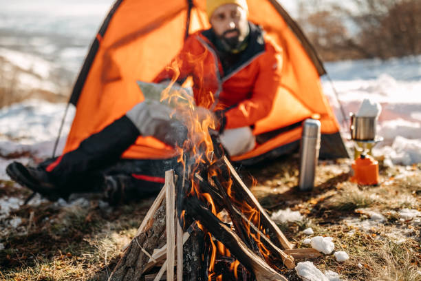 istock Man preparing food on mountain 1168219282
