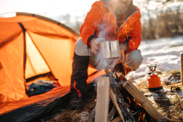 istock Man preparing food on mountain 1168220096