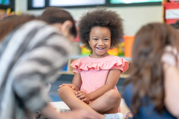 istock Multi-ethnic group of preschool students in class 1168222926