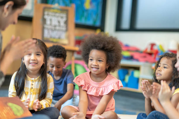 istock Multi-ethnic group of preschool students in class 1168222927