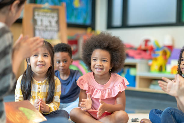 istock Multi-ethnic group of preschool students in class 1168222983