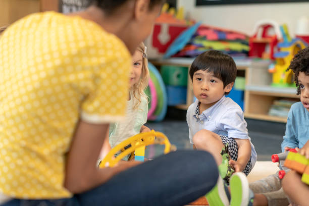 istock Multi-ethnic group of preschool students in class 1168222990