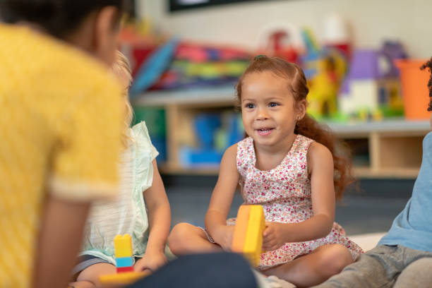 istock Multi-ethnic group of preschool students in class 1168223007