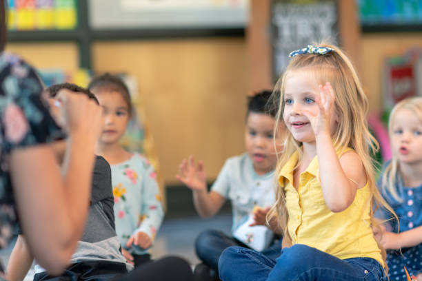 istock Multi-ethnic group of preschool students in class 1168223080