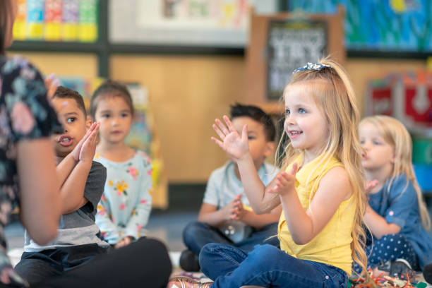 istock Multi-ethnic group of preschool students in class 1168223083