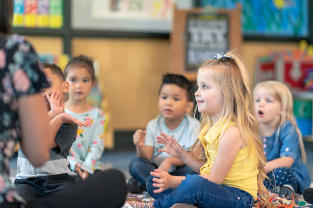 istock Multi-ethnic group of preschool students in class 1168223084