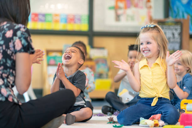 istock Multi-ethnic group of preschool students in class 1168223087