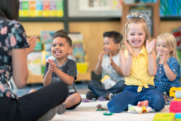 istock Multi-ethnic group of preschool students in class 1168223089
