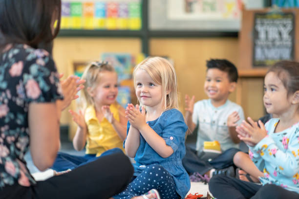 istock Multi-ethnic group of preschool students in class 1168223091