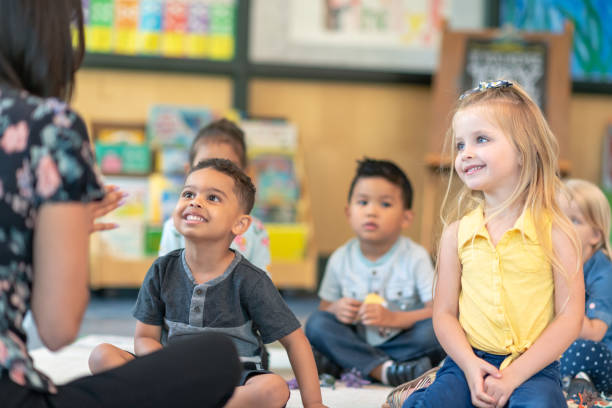 istock Multi-ethnic group of preschool students in class 1168223093