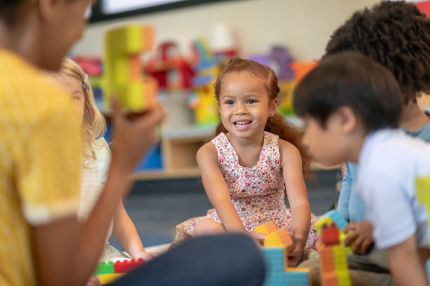 istock Multi-ethnic group of preschool students in class 1168223193