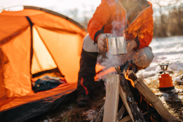 istock Man preparing food on mountain 1168223275