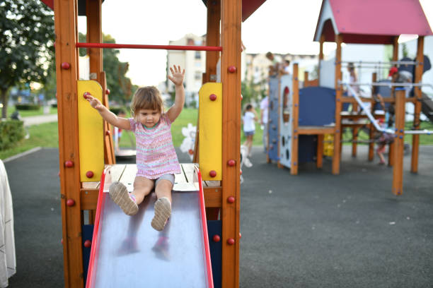 istock Two year old girl playing outdoors in summer 1168223925