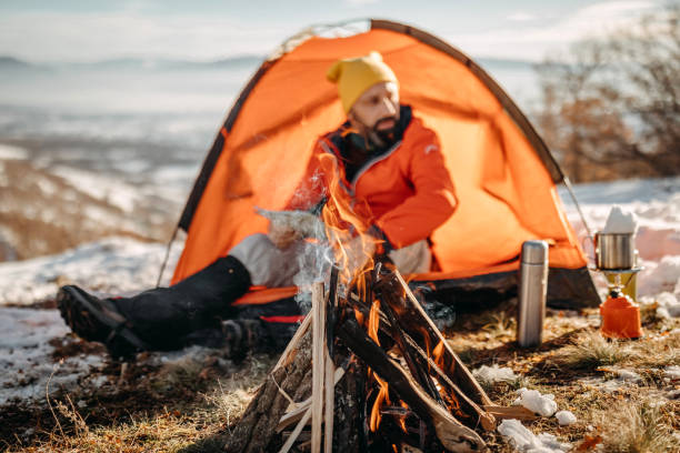 istock Man preparing food on mountain 1168224241
