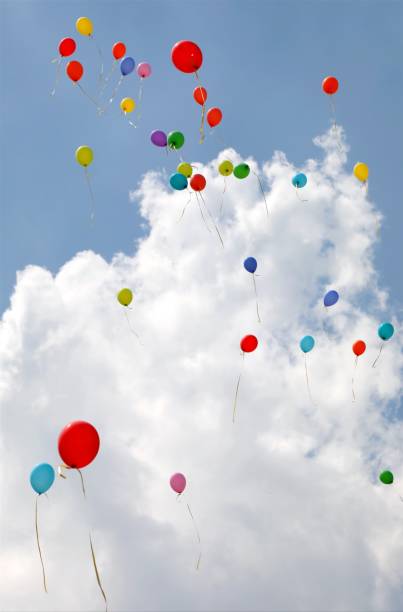 istock balloons fly in the sky with white cloud during the celebratory 1168224452