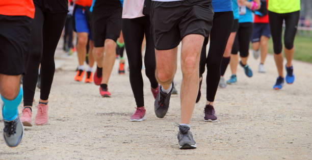istock running athletes during a cross-country race 1168224601