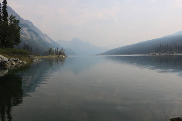 istock calm lake in canada national park 1168225370