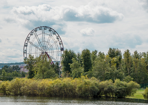 Ferris wheel in the city park.