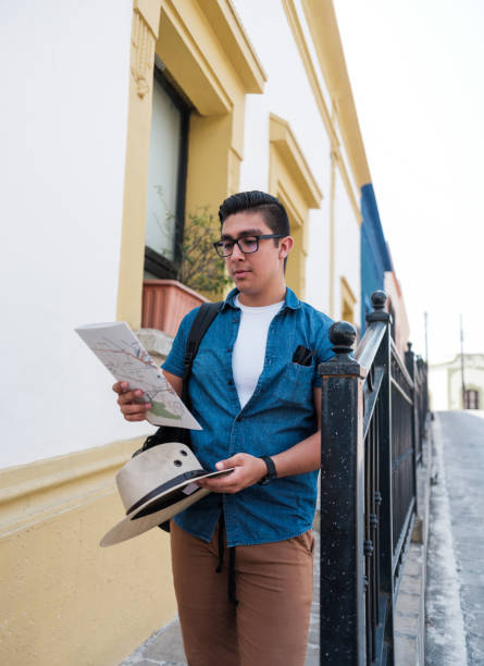 istock Young traveler exploring a new town 1168225639