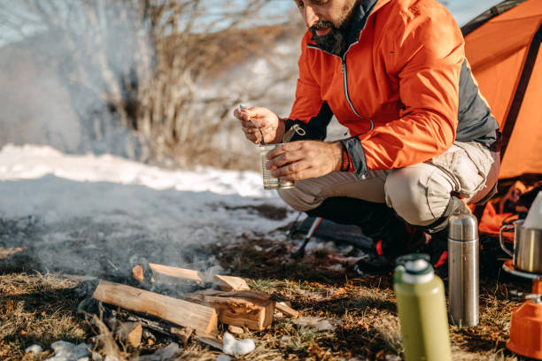 istock Man preparing food on mountain 1168225879