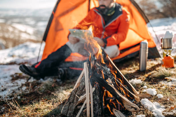istock Man preparing food on mountain 1168227123