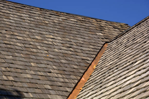 new wood shingle roof with copper gutter