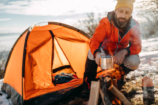 istock Man preparing food on mountain 1168227683