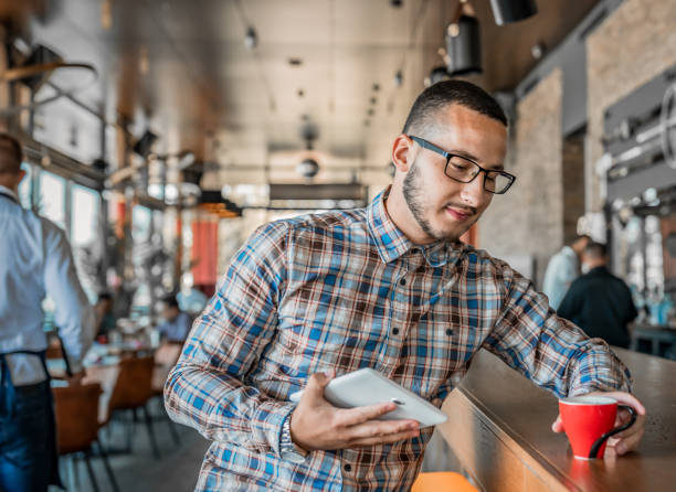 istock Portrait of young attractive man using tablet 1168227771