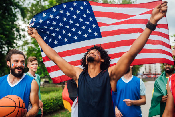 istock Euphoric sport fans celebrating the win 1168228795