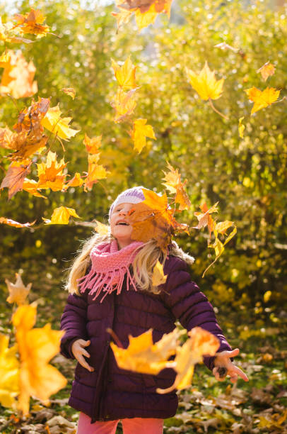 istock child in autumnal time 1168229823
