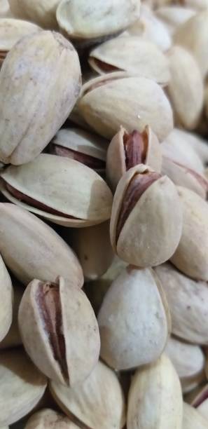 istock Photograph of pistachios 1168229950