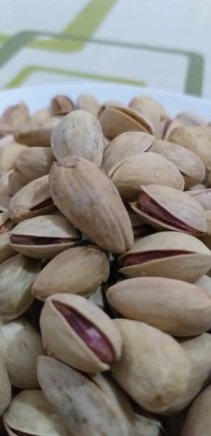 istock Photograph of pistachios 1168230050