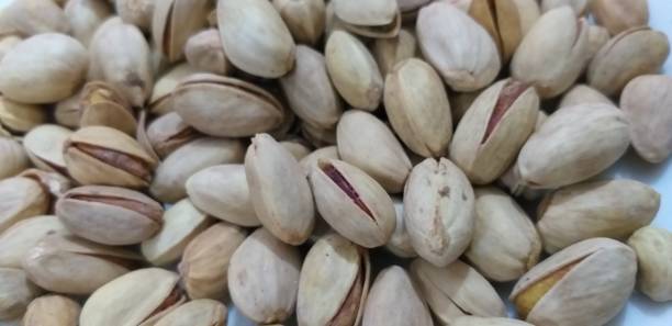 istock Photograph of pistachios 1168230085