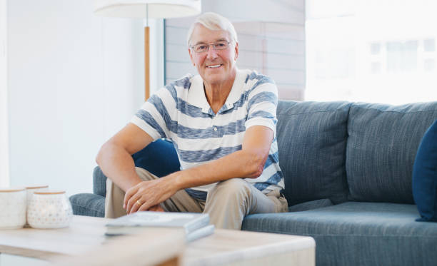 Shot of a senior man relaxing on the sofa at home
