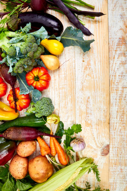 istock Fresh colorful organic vegetables from above. Top view, flat lay. Different vegetables for eating healthy on wooden background. Clean eating food frame. Copy space. Vegetarian, vegan. 1168234118