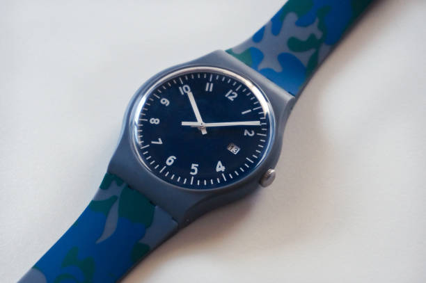 istock Blue swiss watch with rubber strap close up white background 1168234583