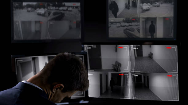 istock Security guard sleeping in front of surveillance camera, twenty-for-hour work 1168237243