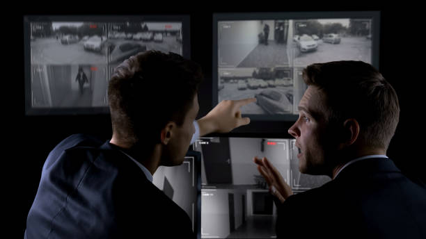 istock Detectives watching camera records, searching for crime evidence, investigation 1168237990