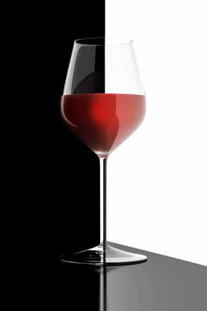 istock glass of red wine black and white reflections 1168239652