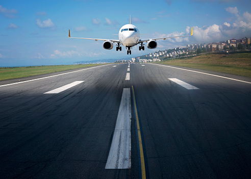 Passenger airplane landing or taking off at dusk