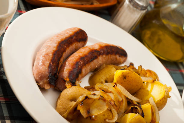 istock Grilled sausages with potatoes 1168245251