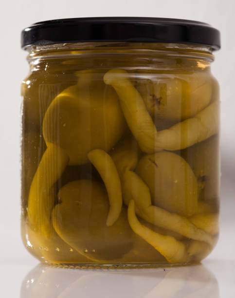 istock Jar with delicious whole olives marinated with hot pepper 1168245850