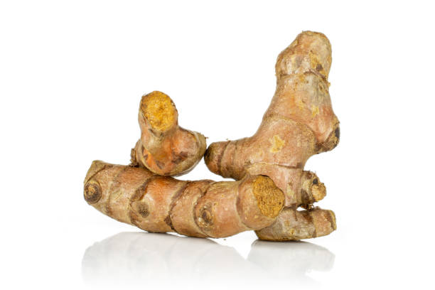 istock Bright turmeric rhizome isolated on white 1168248417